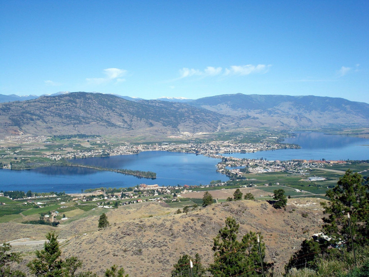 Osoyoos Lake and town seen from Anarchist Mountain Lookout, surrounded by dry hills