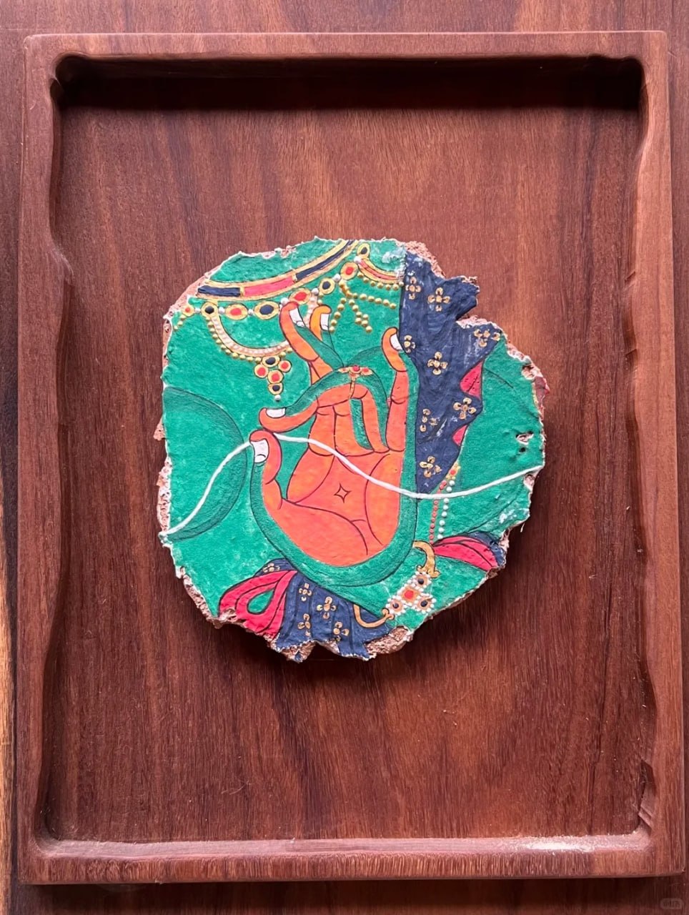 Hand of Blessing Dunhuang-inspired artwork with symbolic hand gesture, teal background, and ornate mural details